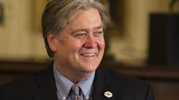 epa05755203 Chief Strategist and Senior Counselor Stephen Bannon enters a joint press conference with US President Donald J. Trump and British Prime Minister Theresa May in the East Room of the White  ...