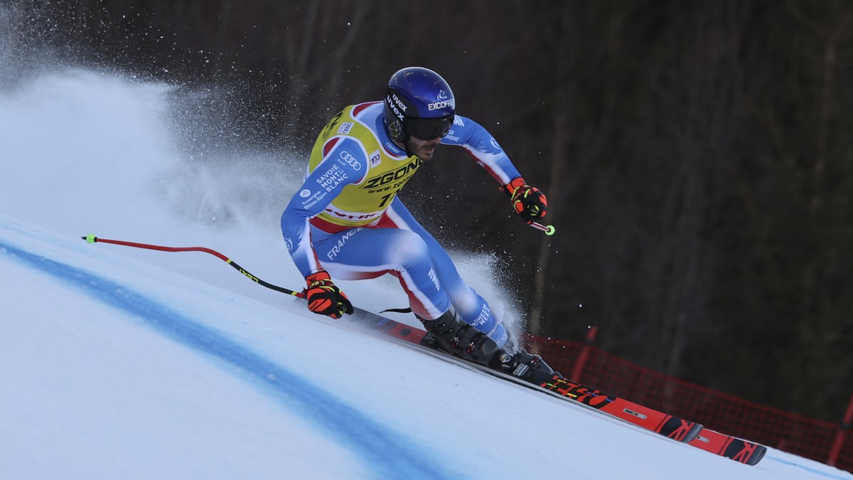 France's Cyprien Sarrazin speeds down the course during an alpine ski, men's World Cup downhill training, in Bormio, Italy, Friday, Dec. 27, 2024. (AP Photo/Marco Trovati)