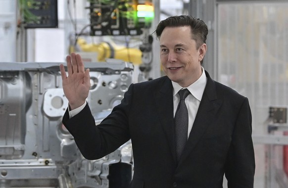 FILE - Tesla CEO Elon Musk attends the opening of the Tesla factory Berlin Brandenburg in Gruenheide, Germany, Tuesday, March 22, 2022. Musk has used Twitter to announce he had met with Pope Francis.  ...
