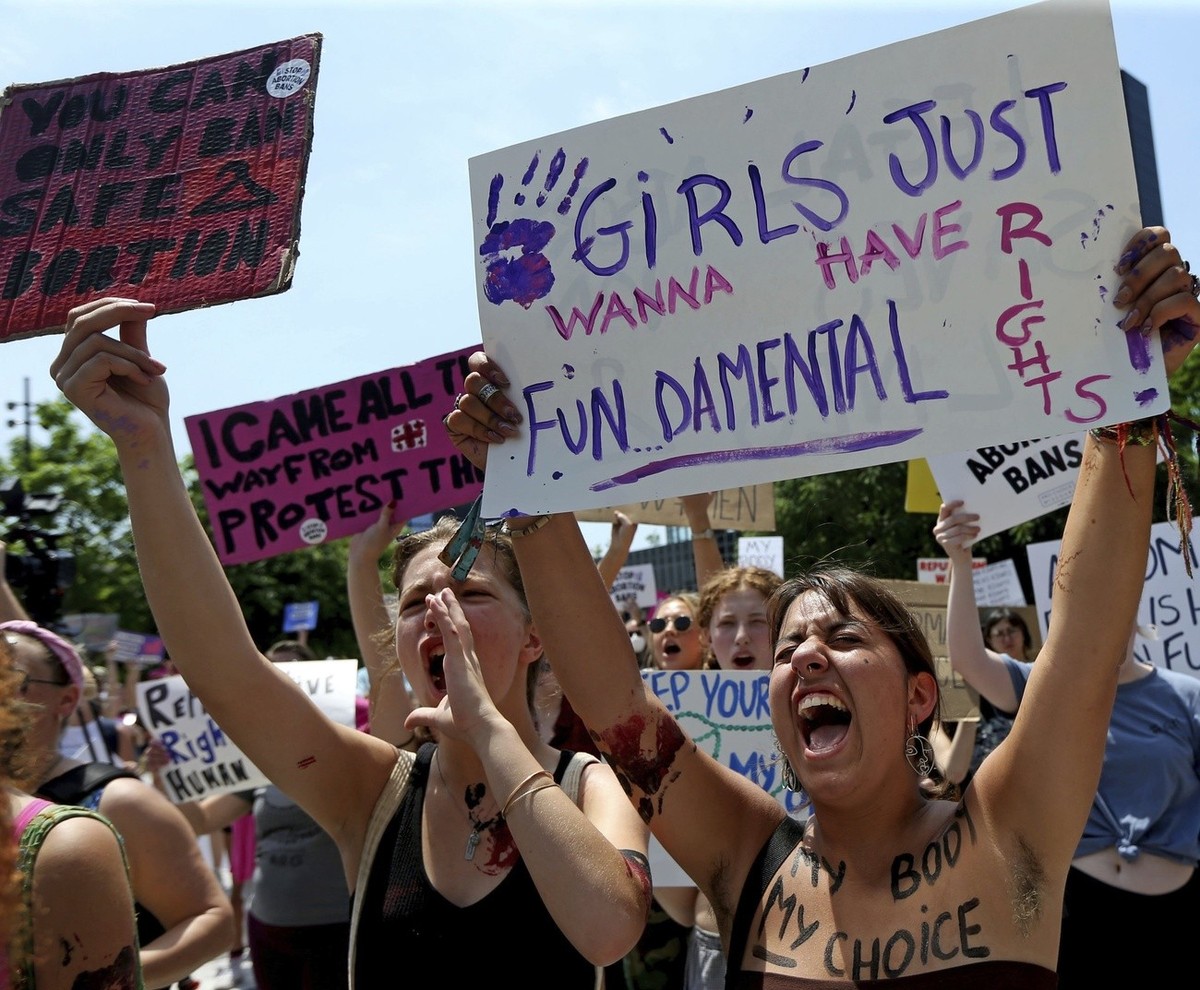 Hobie Wolff and Violeta Martos shout for reproductive rights at an abortion rights rally on Saturday, May 14, 2022, at Kiener Plaza in downtown St. Louis.