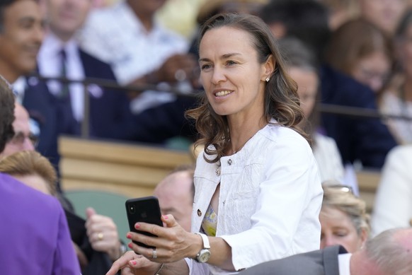 Former Wimbledon champion Martina Hingis takes her seat in the Royal Box for the final of the women's singles between Tunisia's Ons Jabeur and Kazakhstan's Elena Rybakina on day thirteen of the Wimble ...