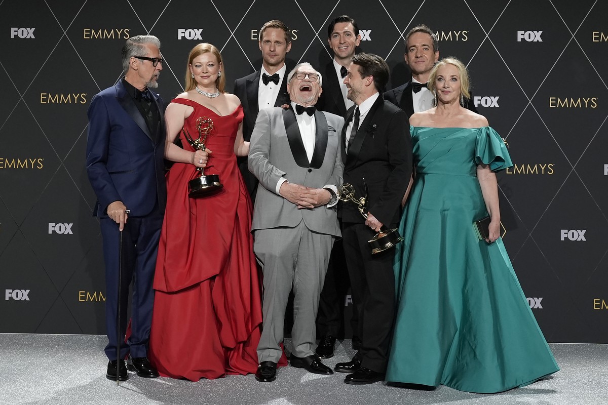 Alan Ruck, from left, Sarah Snook, Alexander Skarsgard, Brian Cox, Nicholas Braun, Kieran Culkin, Matthew Macfayden, and J. Smith-Cameron, winners of the award for outstanding drama series for "S ...
