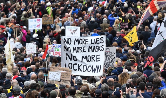 epa08699385 Thousands of people attend a rally at Trafalgar Square in London, Britain, 26 September 2020. Thousands of people turned out to attend the &#039;We Do Not Consent&#039; rally to protest ag ...