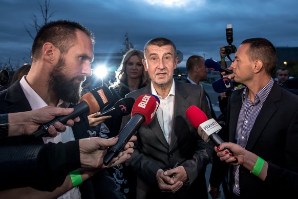 epa06280912 Andrej Babis (C), Slovak-born billionaire and leader of the ANO movement, arrives at the ANO movement election event in Prague, Czech Republic, 21 October 2017. Around 8 million people age ...