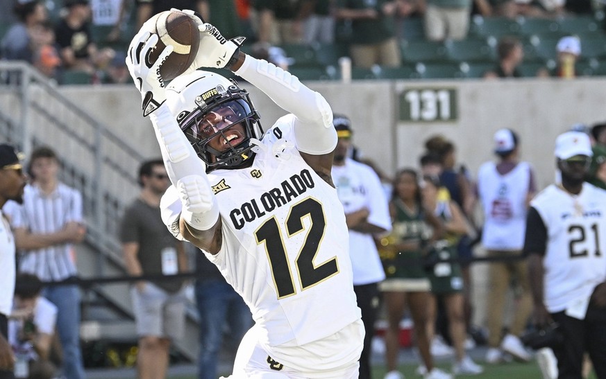 September 14, 2024: Colorado Buffaloes wide receiver/cornerback Travis Hunter 12 catches a pass during warmups before the football game between Colorado and Colorado State in Fort Collins, CO. /CSM. - ...