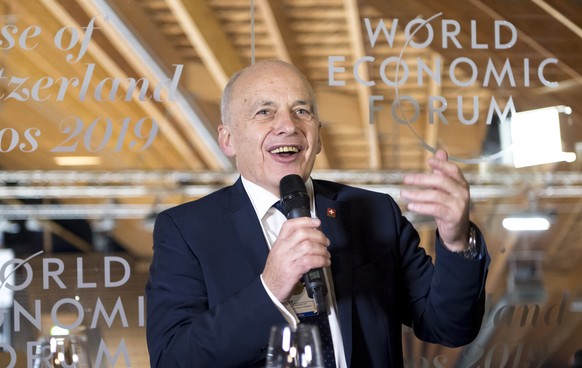 Swiss Federal President Ueli Maurer speaks during the opening of The House of Switzerland, HOS, in the Vaillant Arena ice rink on the sideline of the first day of the 49th Annual Meeting of the World  ...