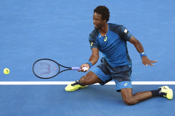 France&#039;s Gael Monfils plays a forehand return to Germany&#039;s Philipp Kohlschreiber during their third round match at the Australian Open tennis championships in Melbourne, Australia, Saturday, ...