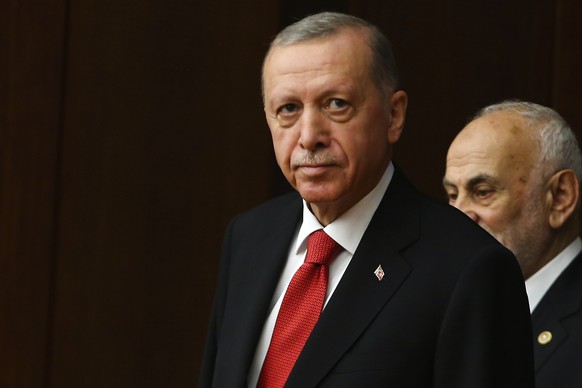 FILE - Turkish President Recep Tayyip Erdogan joins legislators elected to the Grand National Assembly of Turkey in the May 14 parliamentary elections and attend their first parliamentary session to t ...