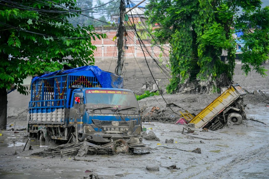 Flash Floods And Mudslides Devastate Nuwakot, Nepal An aftermath view of flash floods and mudslides along the Trishuli River in Nuwakot, Nepal, on August 26, 2026. A flash flood swept through Nepal s  ...