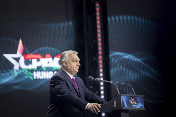 epa12142621 A handout photo made available by the Hungarian Prime Minister&#039;s Office General Department of Communication shows Prime Minister of Hungary Viktor Orban delivering his opening address ...
