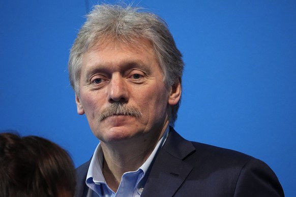 Kremlin spokesman Dmitry Peskov looks on prior to Russian President Vladimir Putin&#039;s visit to his campaign headquarters after a presidential election in Moscow in Moscow, Russia, Sunday, March 17 ...