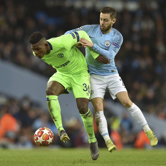 Manchester, United Kingdom, 12.03.2019, UEFA Champions League - 2018/19 Season, Round of 16 Second Leg, Manchester City - FC Schalke 04, Breel Embolo (FC Schalke 04) and Bernardo Silva (Manchester Cit ...