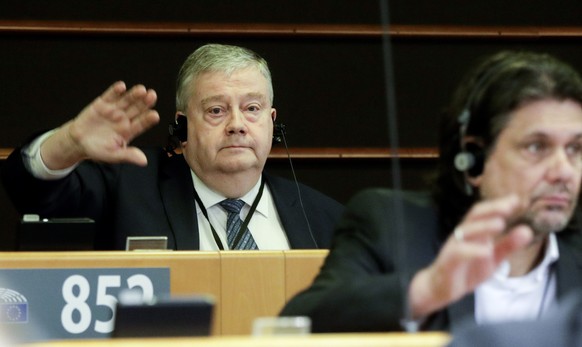 epa10444049 Member of the European Parliament Belgian Marc Tarabella votes for the waiver of the immunity during a plenary session of the European Parliament in Brussels, Belgium, 02 February 2023. Eu ...