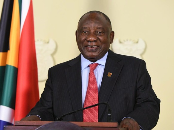 epa10506987 A handout photo made available by GCIS shows South African President Cyril Ramaphosa addressing the nation overnight while announcing his new cabinet and a new Deputy President, Pretoria,  ...