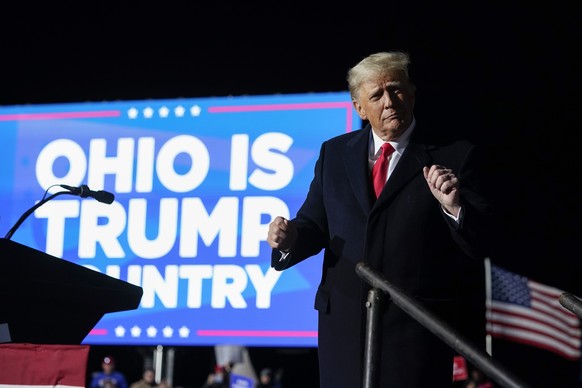 Former President Donald Trump dances after he finished speaking at a campaign rally in support of the campaign of Ohio Senate candidate JD Vance at Wright Bros. Aero Inc. at Dayton International Airpo ...