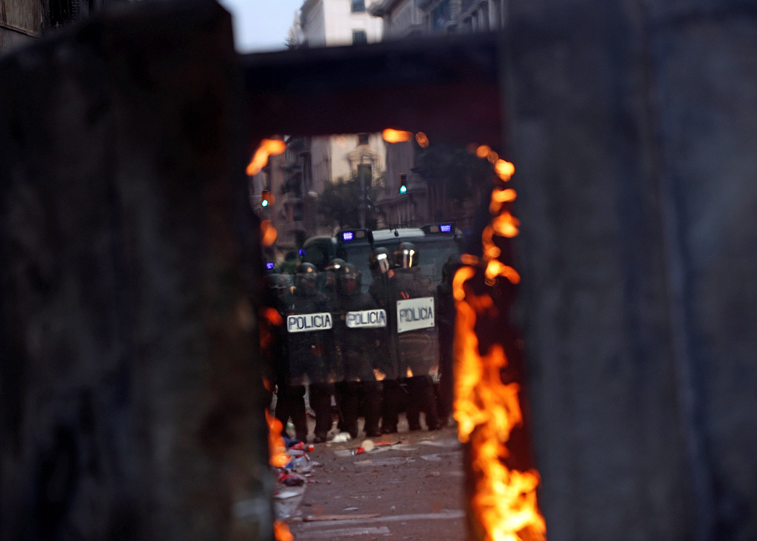 epa07930806 Spanish riot police members prepare to disperse protesters of one of the so-called 'Marches for Freedom' in Barcelona, Spain, 18 October 2019. Catalonia region lives its fourth g ...
