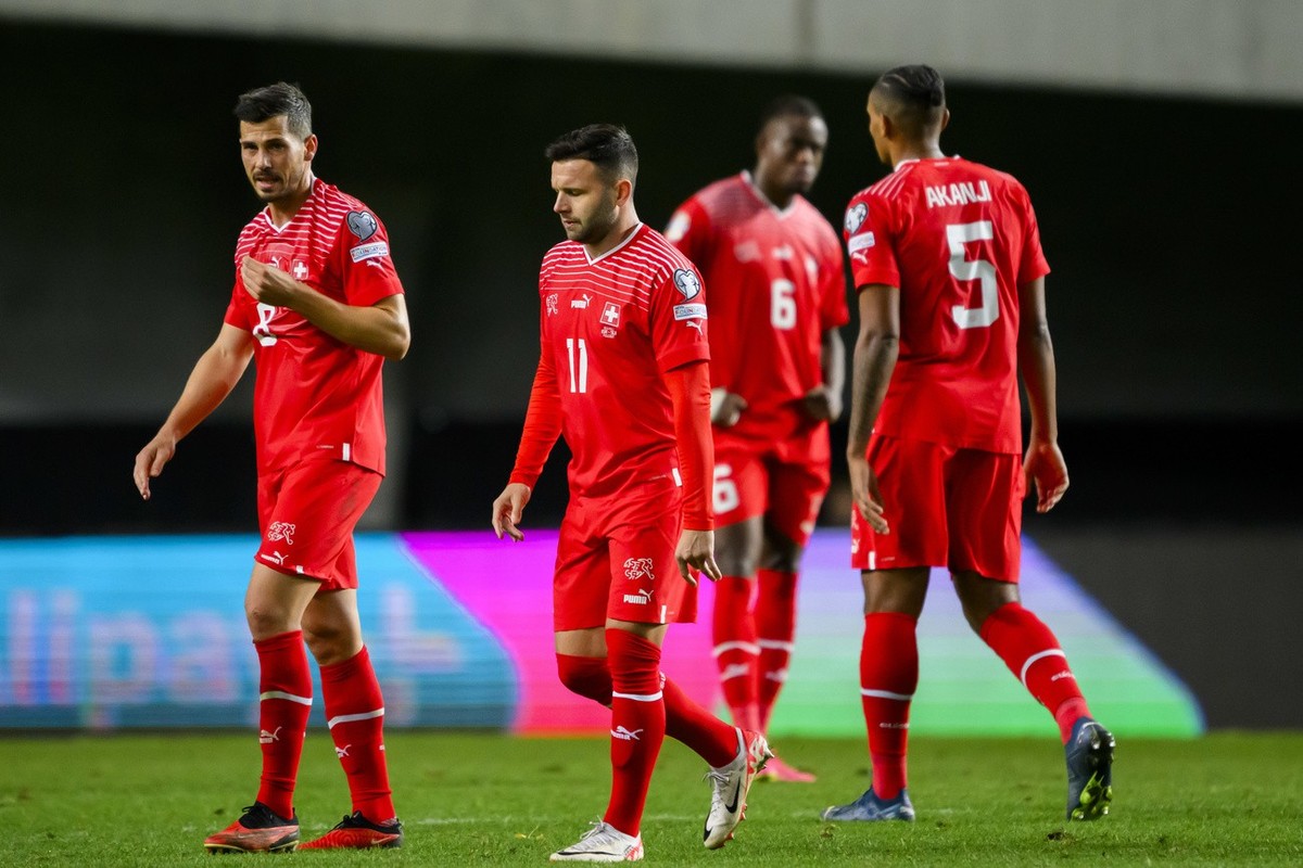 Switzerland's midfielder Remo Freuler, midfielder Renato Steffen, midfielder Denis Zakaria and defender Manuel Akanji, from left to right, react after the 1:1 goal scored by Israel's forward ...
