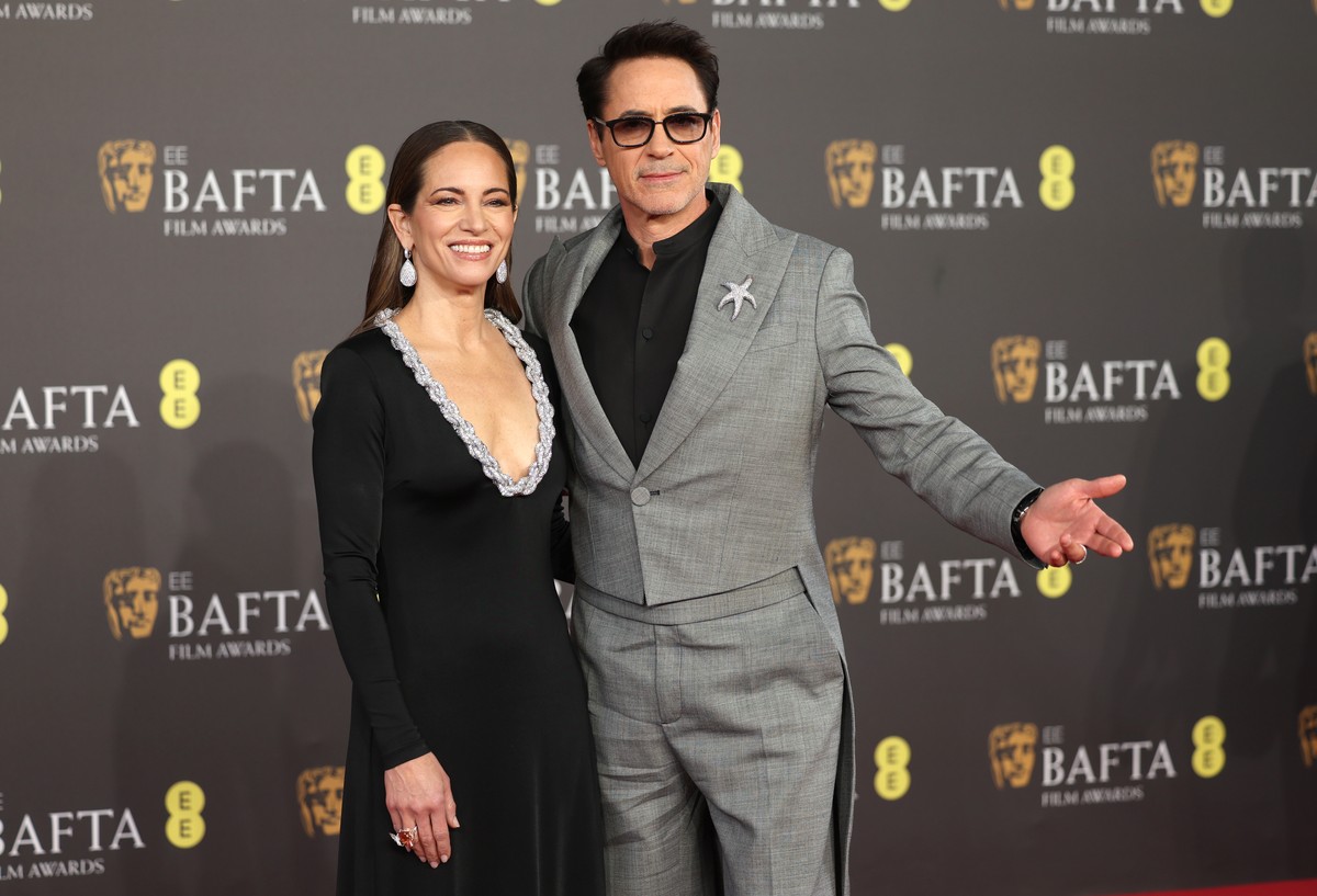 epa11163670 Susan Downey and Robert Downey jr attend the 2024 EE BAFTA Film Awards at the Royal Festival Hall in London, Britain, 18 February 2024. The ceremony is hosted by the British Academy of Fil ...