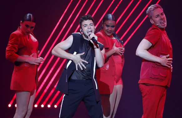 Luca Haenni of Switzerland performs the song 'She Got Me" during the 2019 Eurovision Song Contest grand final in Tel Aviv, Israel, Saturday, May 18, 2019. (AP Photo/Sebastian Scheiner)