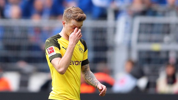 epa07532462 Dortmund&#039;s Marco Reus leaves the pitch after being sent off during the German Bundesliga soccer match between Borussia Dortmund and FC Schalke 04 in Dortmund, Germany, 27 April 2019.  ...