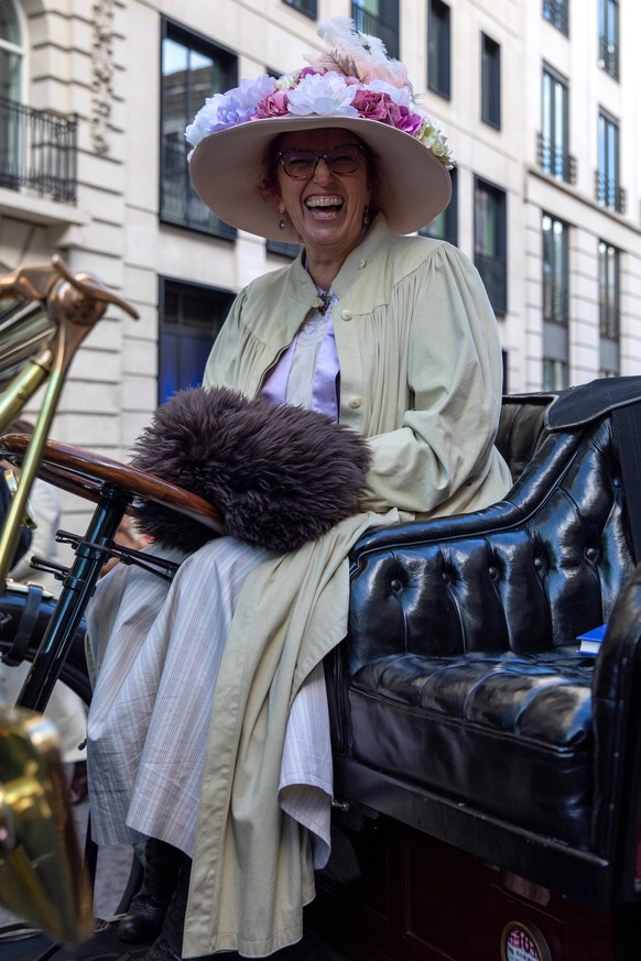 November 1, 2025, London, United Kingdom: The owner of a vintage car sits in the driving seat during a show. Thousands of people gathered on Pall Mall in Central London for the second St Jamess Motori ...