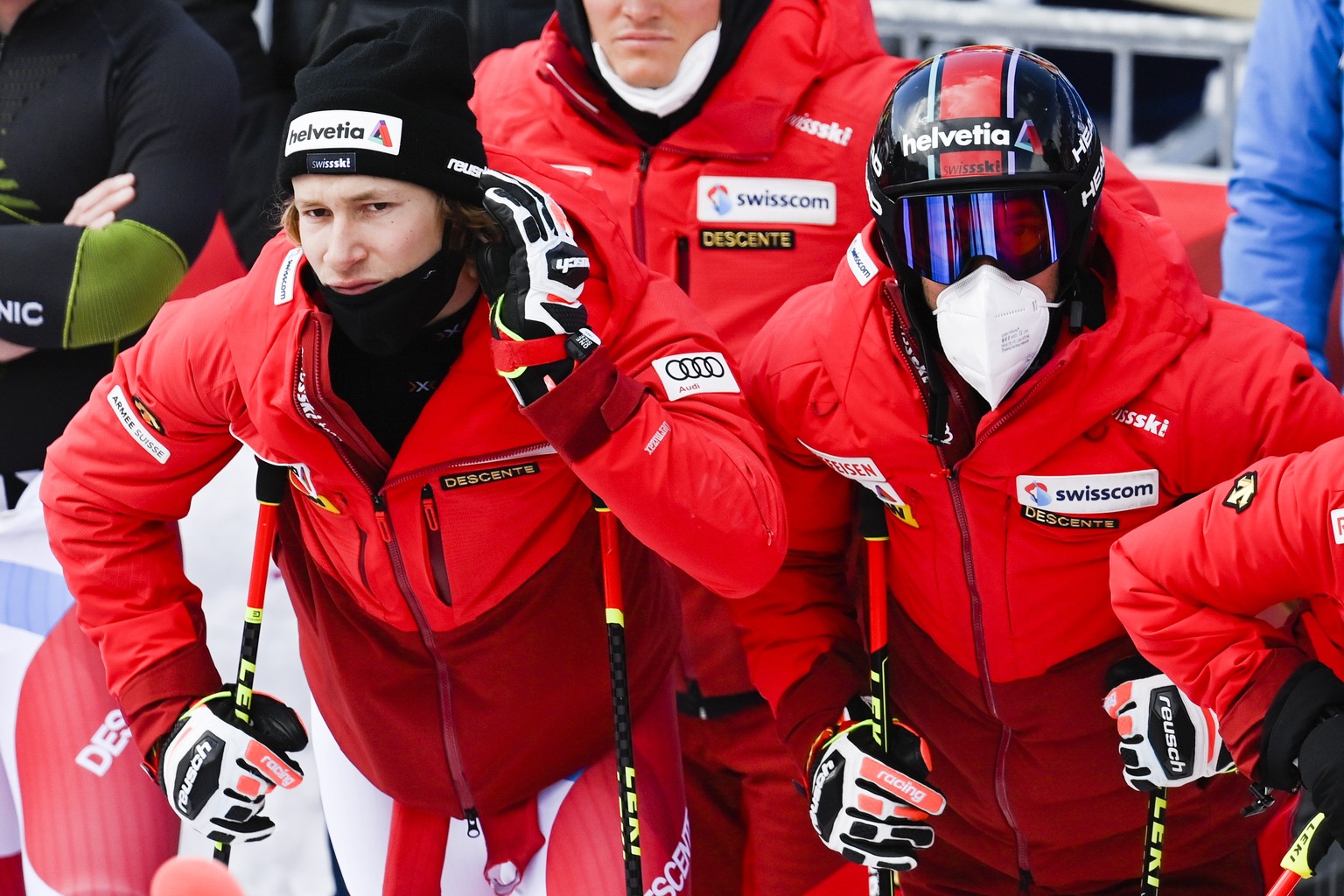 epa09085353 Marco Odermatt (L) of Switzerland reacts in the finish as he watches Alexis Pinturault of France winning the second run of the men&#039;s Giant Slalom race at the FIS Alpine Skiing World C ...