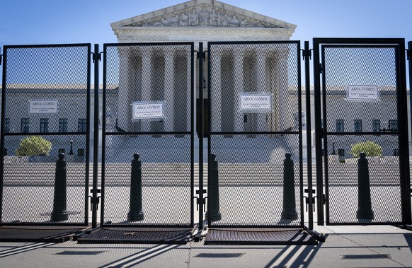 FILE - Anti-scaling fencing blocks off the Supreme Court, May 10, 2022, in Washington. (AP Photo/Jacquelyn Martin, File)