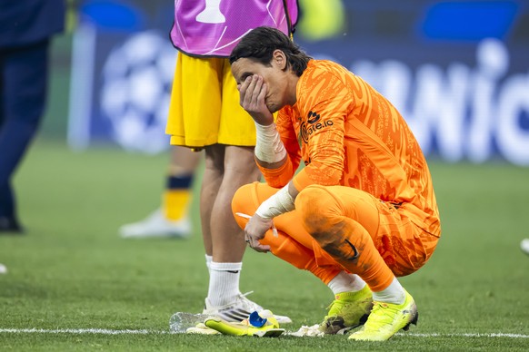 Inter Milan's goalkeeper Yann Sommer reacts after losing against the PSG, during the Champions League final soccer match between Paris Saint-Germain and Inter Milan at the Allianz Arena in Munich ...