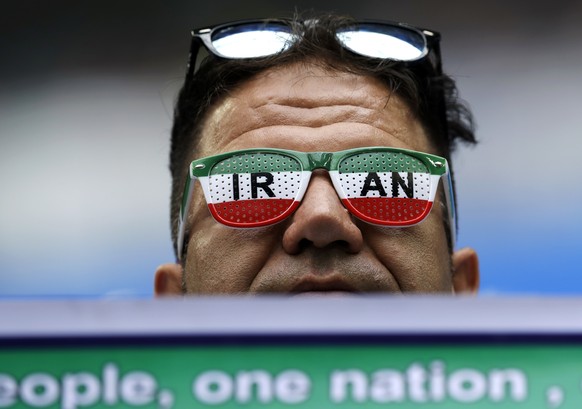 A Iran fan waits for the starting of the group B match between Morocco and Iran at the 2018 soccer World Cup in the St. Petersburg Stadium in St. Petersburg, Russia, Friday, June 15, 2018. (AP Photo/T ...