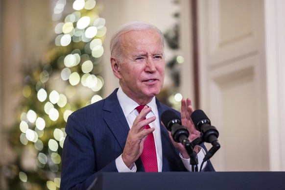 epa10376818 US President Joe Biden delivers a Christmas address from the East Room of the White House in Washington, DC, USA, 22 December 2022. Biden spoke about how divided Democrats and Republicans  ...