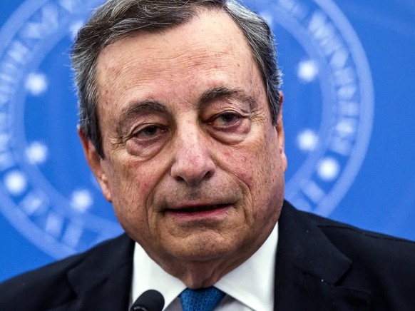 epa10067091 Italian Prime Minister Mario Draghi attends a press conference after the meeting with the CGIL, CISL, and UIL trade unions at the Multifunctional Hall of the Presidency of the Council, Chi ...