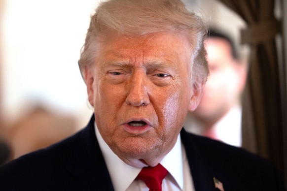 President Donald Trump speaks to reporters aboard Air Force One en route from Joint Base Andrews, Md., to Eau Claire, Wis., Friday, June 5, 2026. (AP Photo/Mark Schiefelbein)
Trump