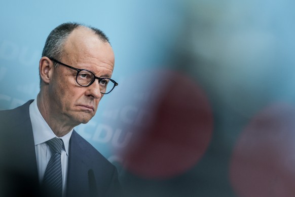 epa12843700 German Chancellor Friedrich Merz attends a press conference after a CDU party executive committee meeting in Berlin, Germany, 23 March 2026. The committee meeting was held after regional s ...