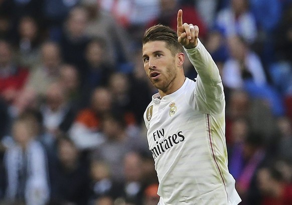 epa04710820 Real Madrid&#039;s defender Sergio Ramos celebrates after scoring a goal during the Spanish Primera Division match between Real Madrid and Malaga at Santiago Bernabeu stadium, in Madrid, S ...