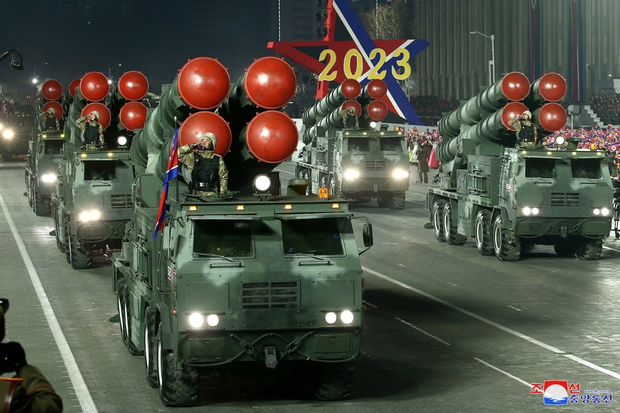 epa10455997 A photo released by the official North Korean Central News Agency (KCNA) shows KN-25 multiple rocket launcher systems displayed during a military parade at Kim Il Sung Square to mark the 7 ...