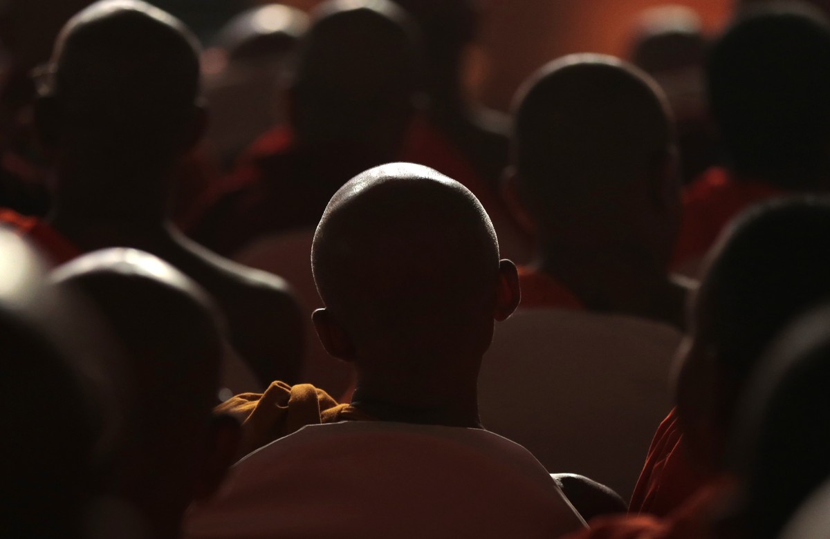 Sri Lankan Buddhist monks listen to Myanmar's hard-line Buddhist monk Ashin Wirathu speak at a convention organized by Sri Lanka's Bodu Bala Sena or Forces of Buddhist Power in Colombo, Sri  ...