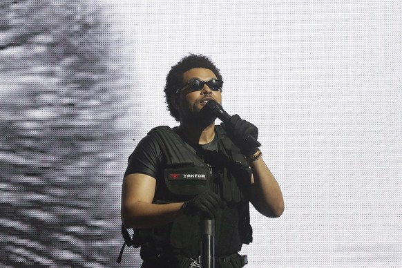 epa09907967 The Weeknd, whose birth name is Abel Makkonen Tesfaye, performs on stage during the Coachella Valley Music and Arts Festival in Indio, near Palm Springs, California, USA, 24 April 2022. EP ...