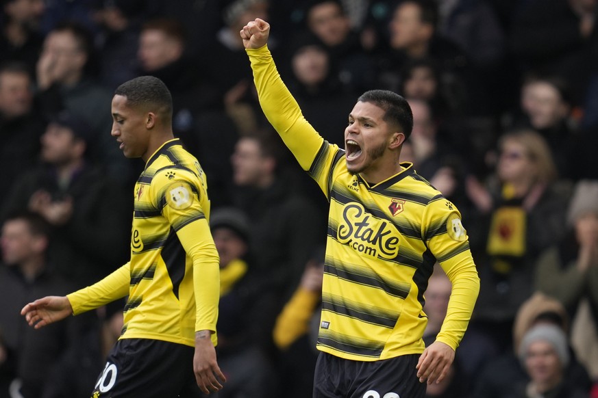 Watford&#039;s Cucho Hernandez, right, celebrates after he scored his side&#039;s first goal during the English Premier League soccer match between Watford and Arsenal, at Vicarage Road, Watford, Engl ...