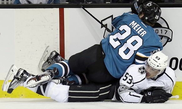 San Jose Sharks&#039; Timo Meier (28) lands on Los Angeles Kings&#039; Kevin Gravel (53) during the first period of an NHL hockey game Tuesday, Jan 3, 2017, in San Jose, Calif. (AP Photo/Ben Margot)