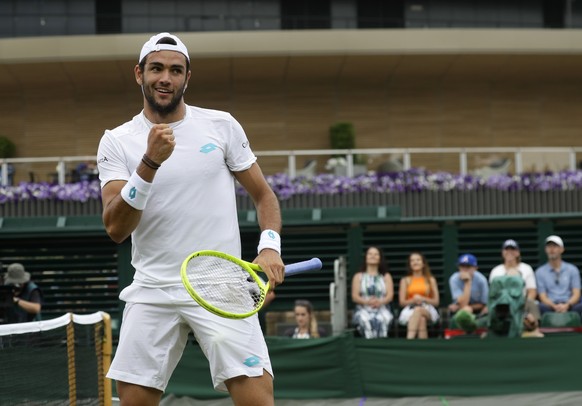 Italy&#039;s Matteo Berrettini celebrates after winning a point against Argentina&#039;s Diego Schwartzman in a Men&#039;s singles match during day six of the Wimbledon Tennis Championships in London, ...