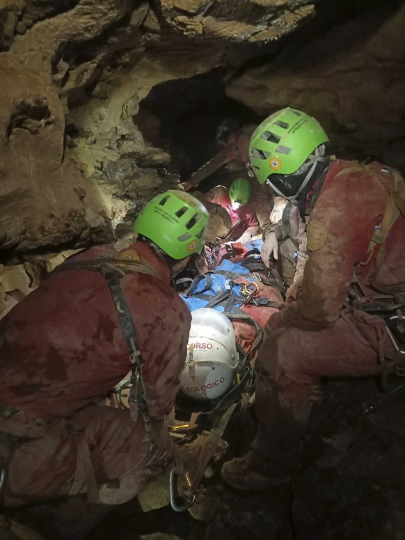 This image released Monday, Dec. 16, 2024 by the Italian Soccorso Alpino (Alpine Rescue) shows the rescue operation of Ottavia Piana, a caver blocked in a deep inside the Bueno Fonteno cave, near Berg ...