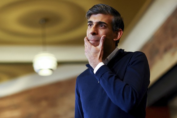 British Prime Minister Rishi Sunak attends a Q&amp;A at The Queens Hotel, a JD Wetherspoon pub in Maltby, England, Thursday March 7, 2024. (Carl Recine/Pool via AP)