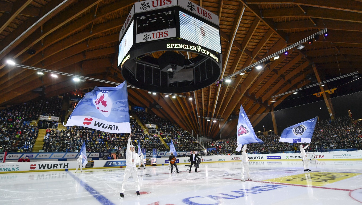 General view of the opening ceremony prior the game between HC Lugano and Avtomobilist Yekaterinburg, at the 90th Spengler Cup ice hockey tournament in Davos, Switzerland, Monday, December 26, 2016. ( ...