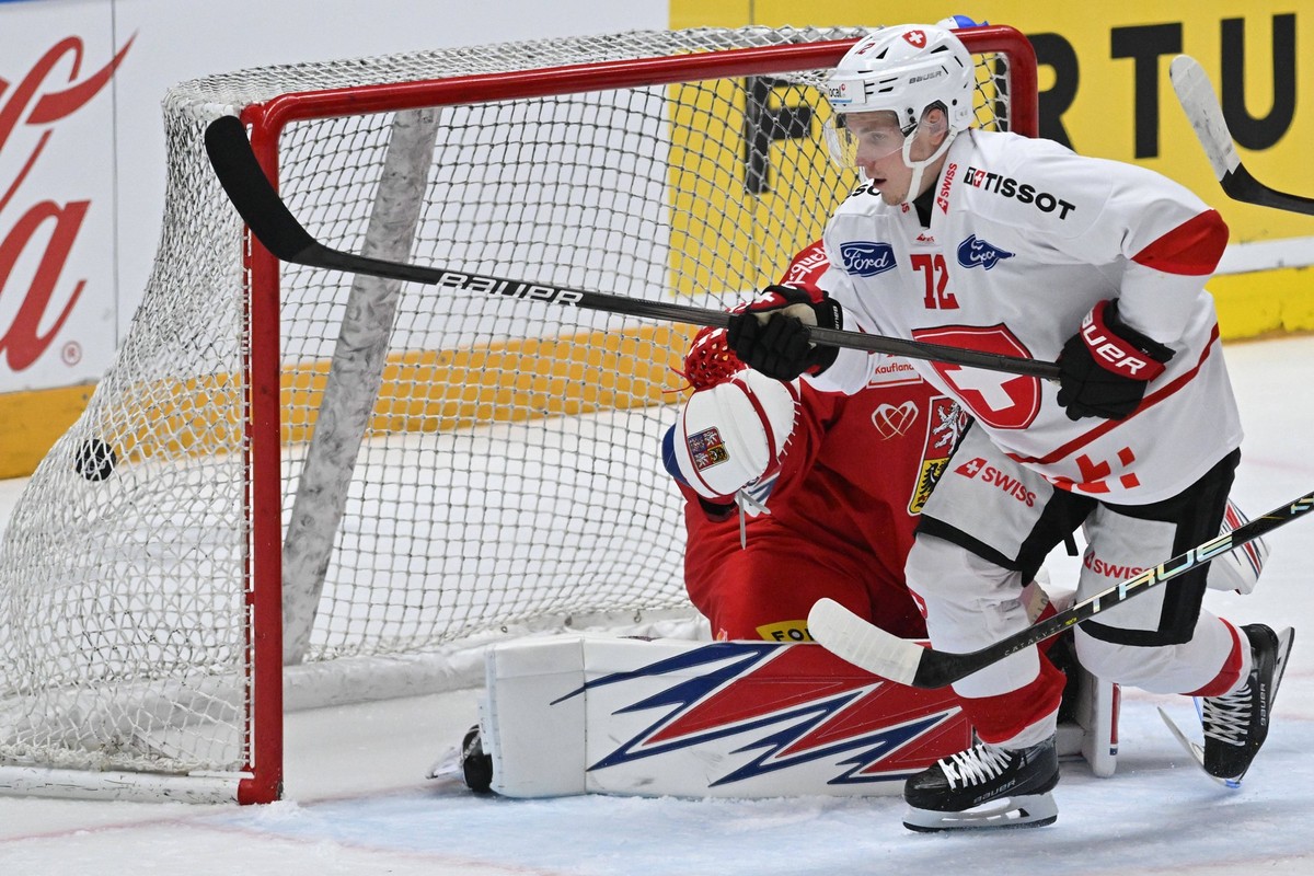 L-R goalkeeper Karel Vejmelka CZE and scoring Dominik Egli SUI in action during the Czech Hockey Games, part of the Euro Hockey Tour EHT, match Czechia vs Switzerland, in Brno, Czech Republic, on May  ...