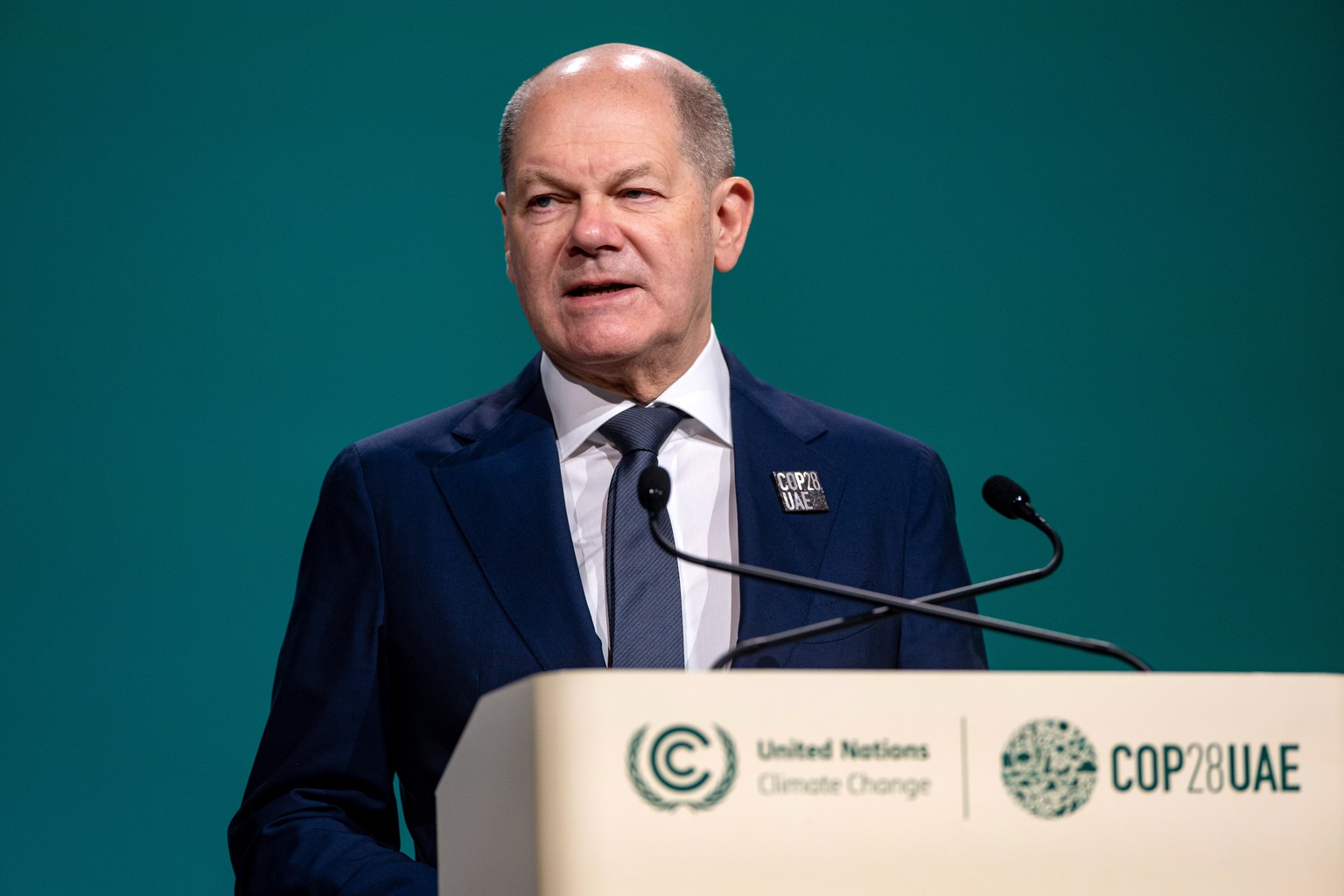 epa11006738 German Cancellor Olaf Scholz speaks during the UN Climate Change Conference COP28, in Dubai, United Arab Emirates, 02 December 2023. The 2023 United Nations Climate Change Conference (COP2 ...