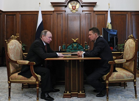 Putin und Gazprom-Chef Alexei Miller.