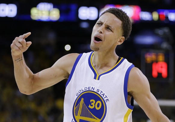 Golden State Warriors guard Stephen Curry (30) celebrates during the second half of Game 5 of basketball&#039;s NBA Finals against the Cleveland Cavaliers in Oakland, Calif., Sunday, June 14, 2015. Th ...