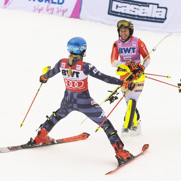 Alpine Skiing: Audi FIS Killington World Cup - Slalom Nov 27, 2022 Killington, Vermont, USA Mikaela Shiffrin of the United States, left, puts her arms out to hug Wendy Holdener of Switzerland tied 1st ...