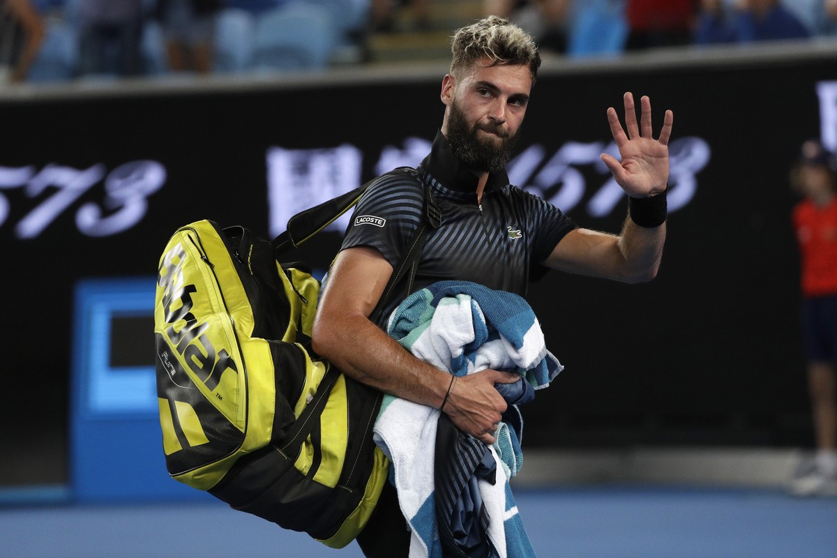 France's Benoit Paire leaves the court after losing to Austria's Dominic Thiem in their first round match at the Australian Open tennis championships in Melbourne, Australia, early Wednesday ...