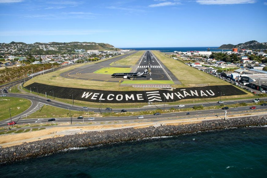 WELLINGTON, NEW ZEALAND - APRIL 19: In the handout image provided by Wellington International Airport, the first trans-Tasman bubble flight from Australia to Wellington lands at Wellington Airport on  ...